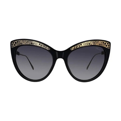 Lunette solaire noir et dore pour femme Chopard